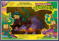 Cave Turtle Mike (with Silly Stegosaurus) from Teenage Mutant Ninja Turtles - Cave Turtles manufactured by Playmates [Front]