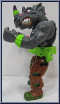 Machine Gunnin' Rocksteady from Teenage Mutant Ninja Turtles - Wacky Action manufactured by Playmates [Loose]
