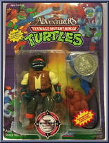 Safari Michelangelo  from Teenage Mutant Ninja Turtles - Adventurers (with Coins) manufactured by Playmates [Front]