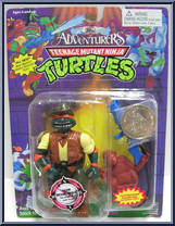 Safari Michelangelo  from Teenage Mutant Ninja Turtles - Adventurers (with Coins) manufactured by Playmates [Front]