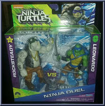 Rocksteady vs Leonardo from Teenage Mutant Ninja Turtles - Out of the Shadows - Ninja Duel manufactured by Playmates [Front]