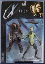 Attack Alien with Primative Man Action Figure